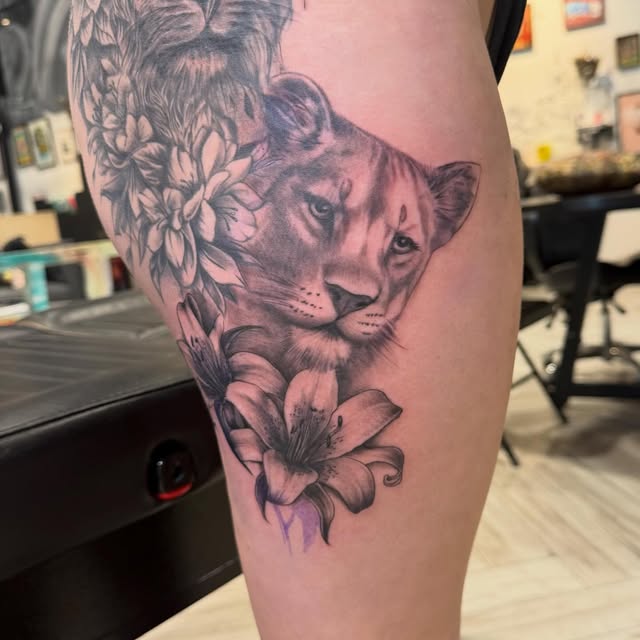 Lioness black and grey realism tattoo by Lua at Yes Electric Tattoo Toronto