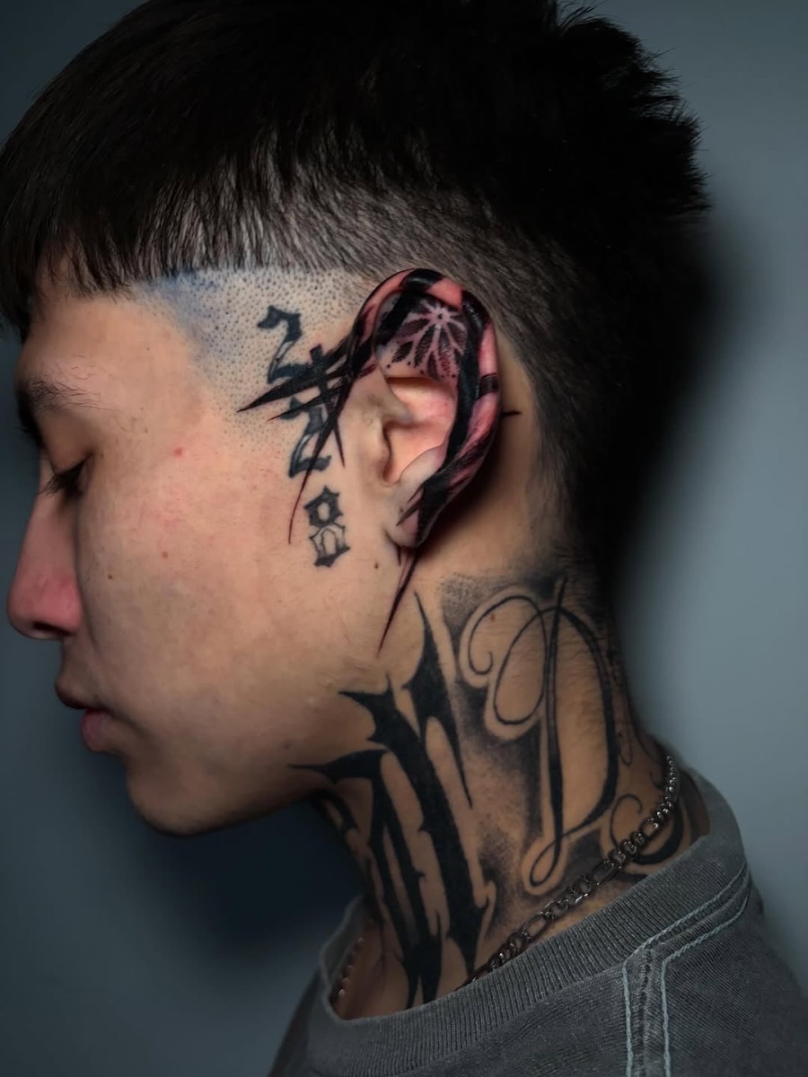Black and grey head and neck tattoo, Queen West Toronto