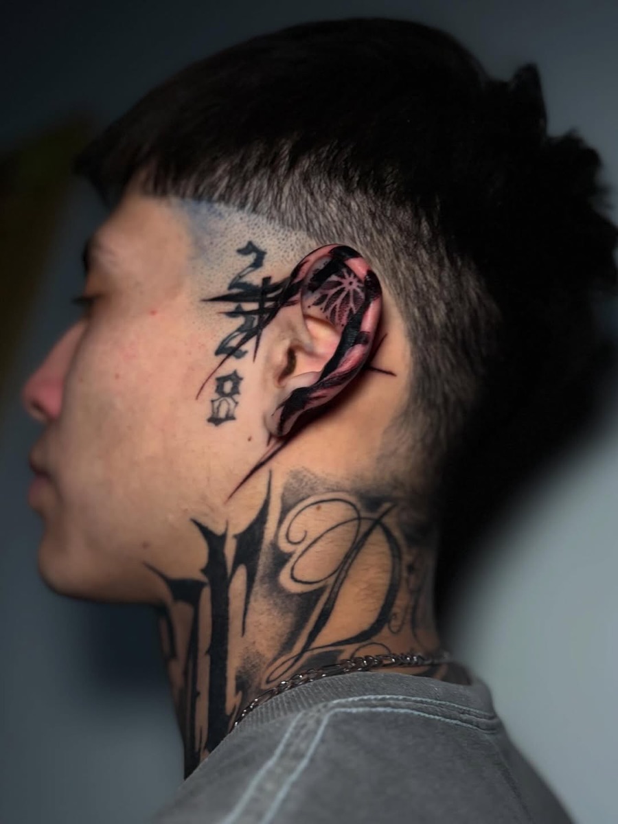 Black and grey head tattoo at Yes Electric Tattoo