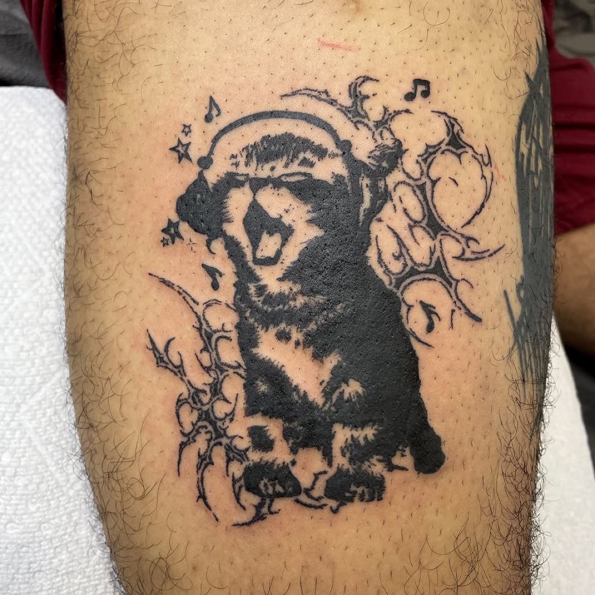 Black and grey skull and face tattoo, Queen West Toronto