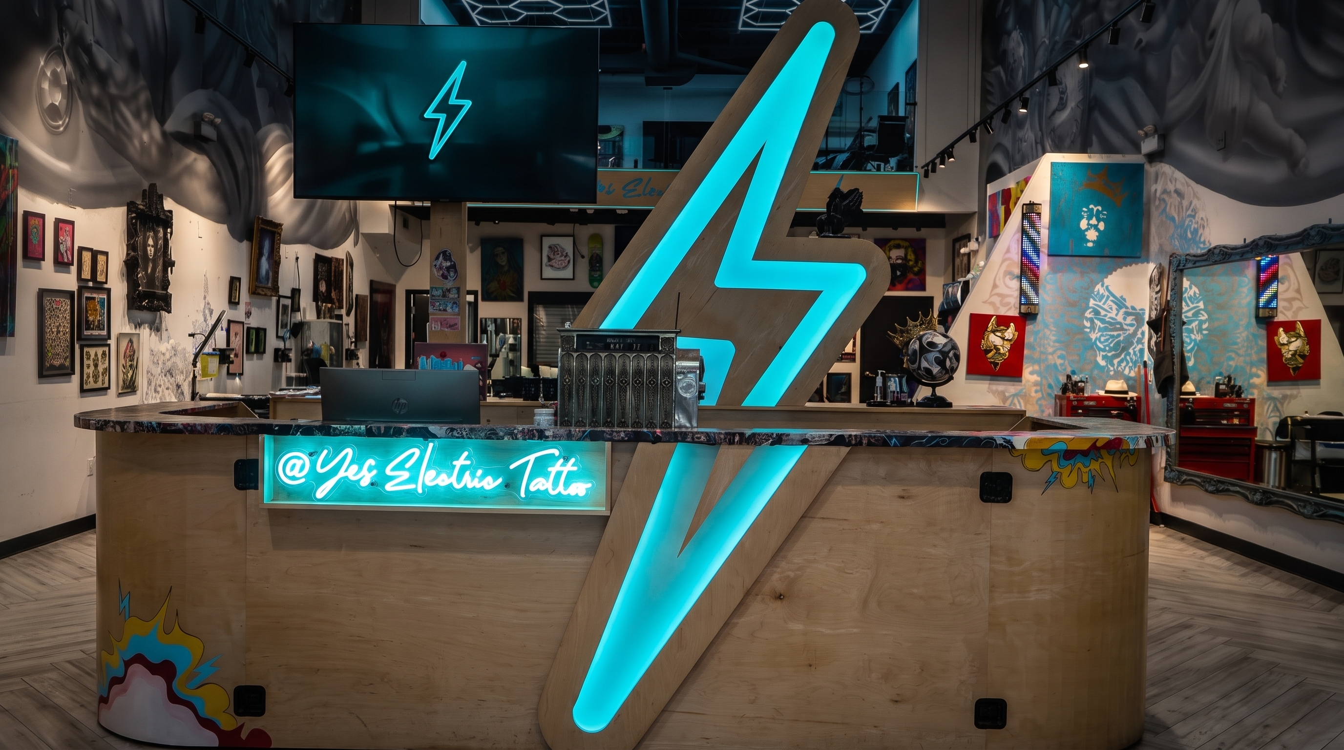 Yes Electric front desk on Queen West, Toronto — tooth gems, tattoos and piercings